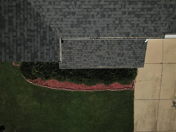 Owens Corning Duration Williamsburg Gray shingles on a roof replacement by Baker Home Exteriors