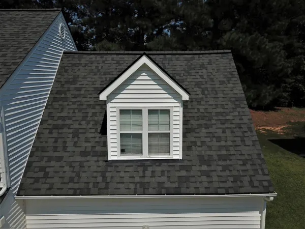 Owens Corning Duration Williamsburg Gray shingles on a roof replacement by Baker Home Exteriors