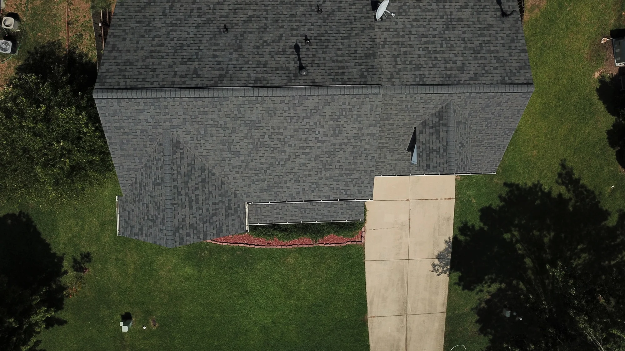 Owens Corning Duration Williamsburg Gray shingles on a roof replacement by Baker Home Exteriors