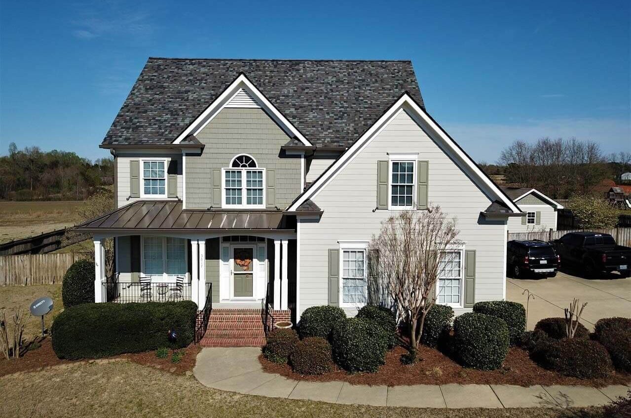 Multicolor gray blue shingle roof replacement