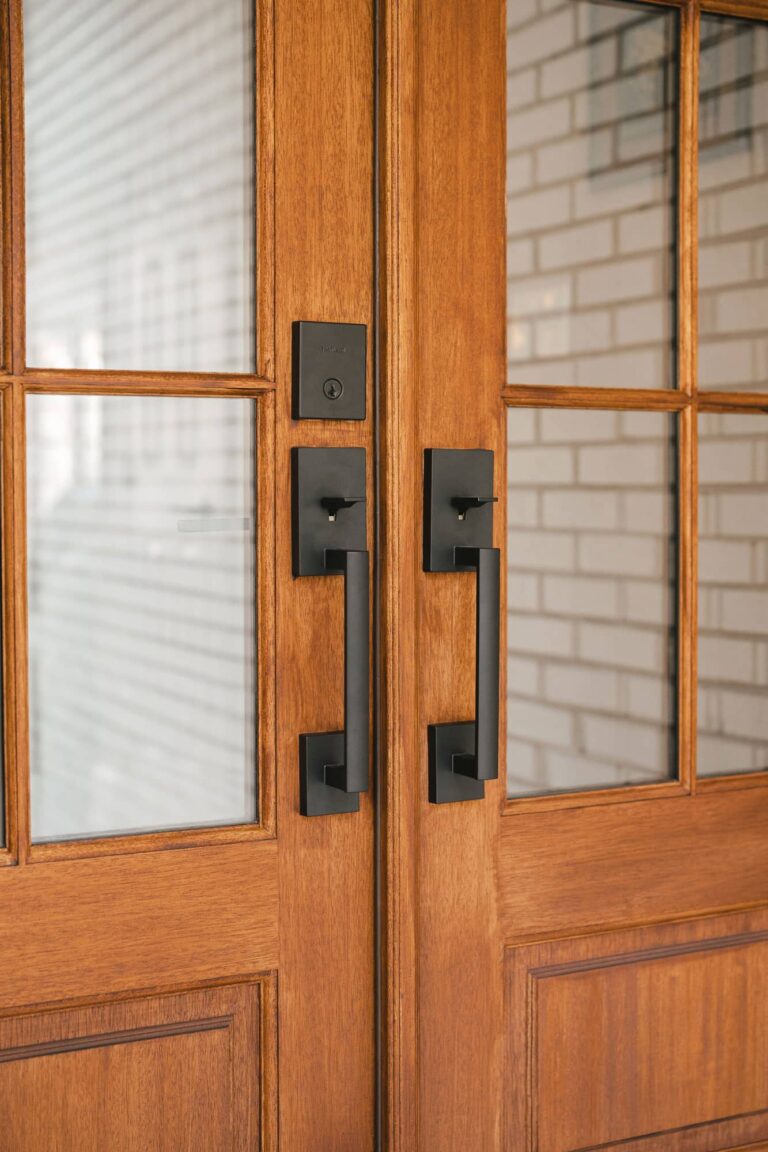 Close up of brown wood exterior front door