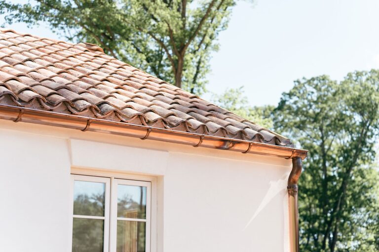 European copper gutters and clay tile roof