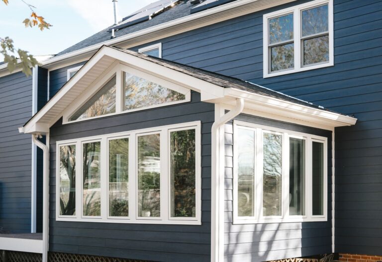 New white window casings on sun room