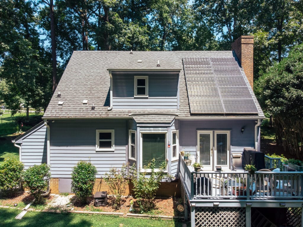 Before image of home with damaged siding